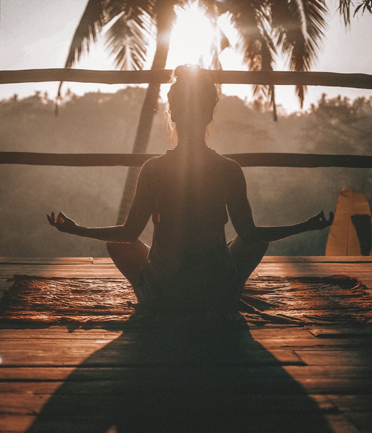 Sunrise stretching pose — representing whole-body wellness at Ascend